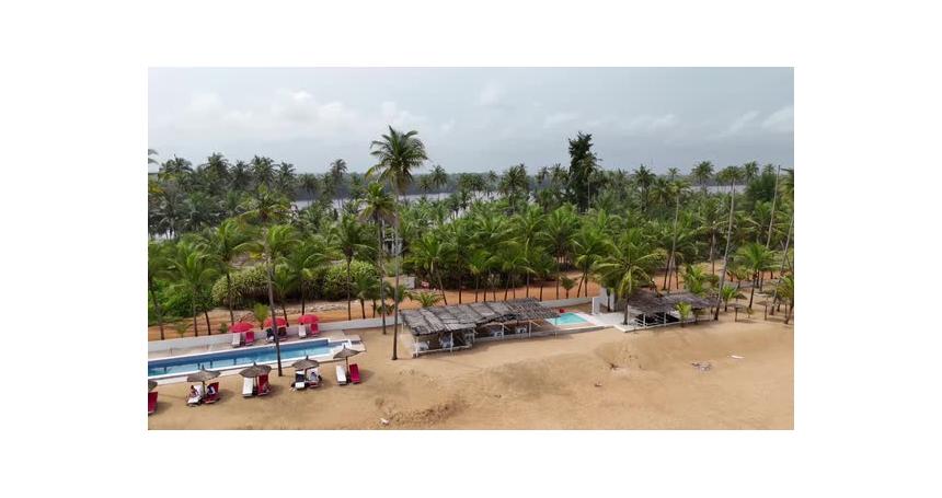 Aerial video over Grand Bassam Ivory Coast, on a sunny day.