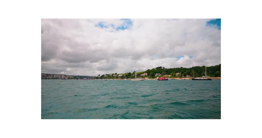 Boat tour on Fal River in Cornwall, United Kingdom, discovering the nearby towns in the region. View