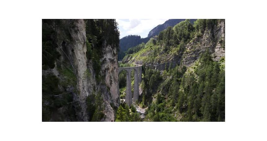 Dramatic aerial drone over the famous Landwasser Viaduct Flyover in Canton Graubunden in the Alps.