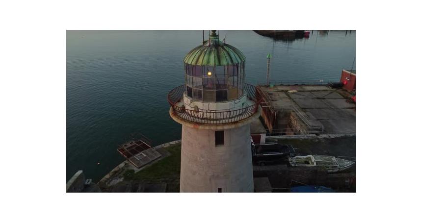 Holyhead Admiralty pier lighthouse aerial view looking down over weathered copper tower dome