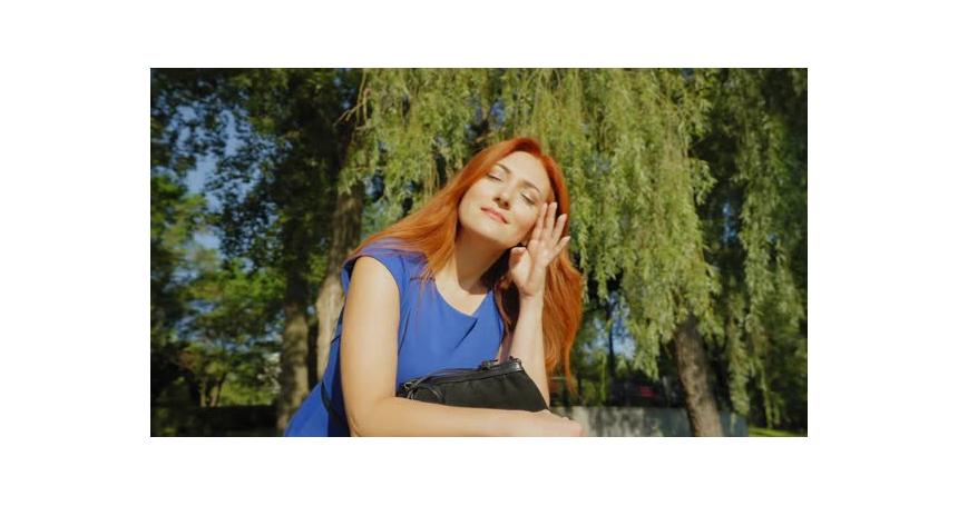 Relaxed Charming Redhead Middle Aged Woman Enjoying Scenic View on Sunny Day